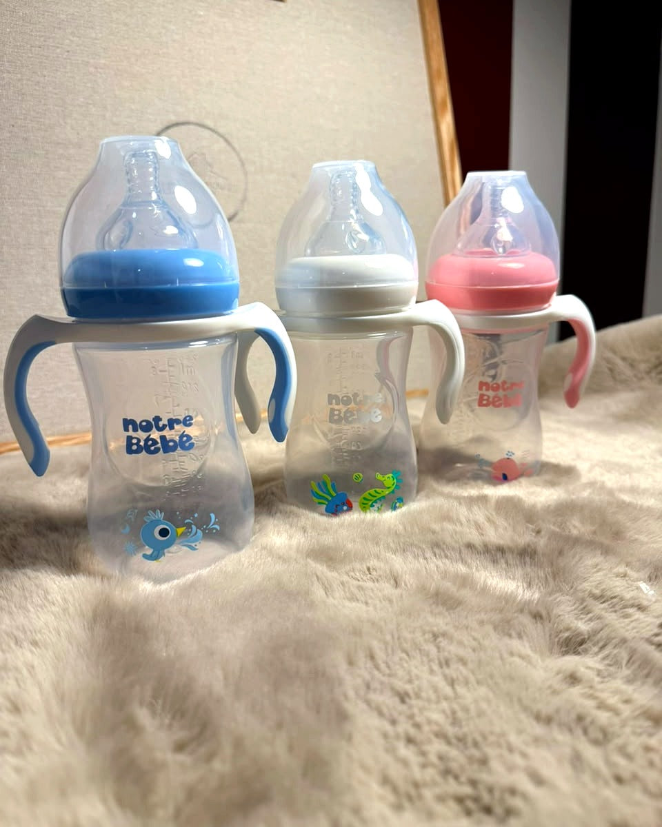 Les 3 coloris du biberon Notre Bébé Wide Neck 240ml avec poignées – Nanou's House