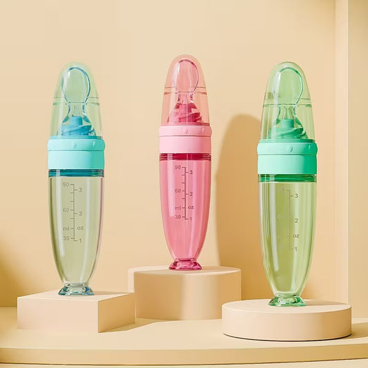 : Biberon cuillère en silicone rose pour bébé, distributeur de purée avec base à ventouse - Nanou's House