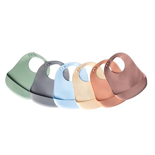 Bavoirs YUMMY en silicone avec poche 4M+ – tous les coloris – Nanou's House